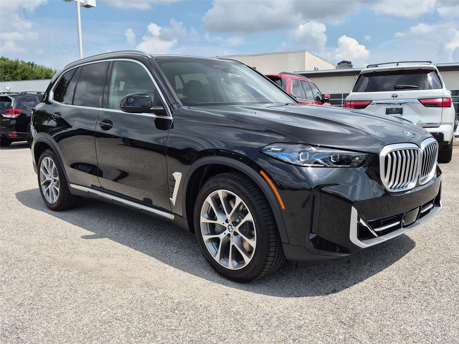New 2026 Black Sapphire Metallic BMW xDrive50e image 7