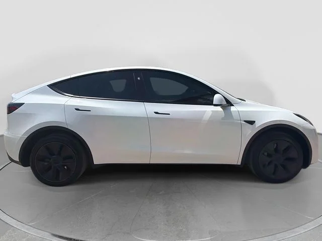 Used 2025 Tesla Model Y Long Range with VIN 7SAYGDED8SF246948 for sale in Jefferson City, MO