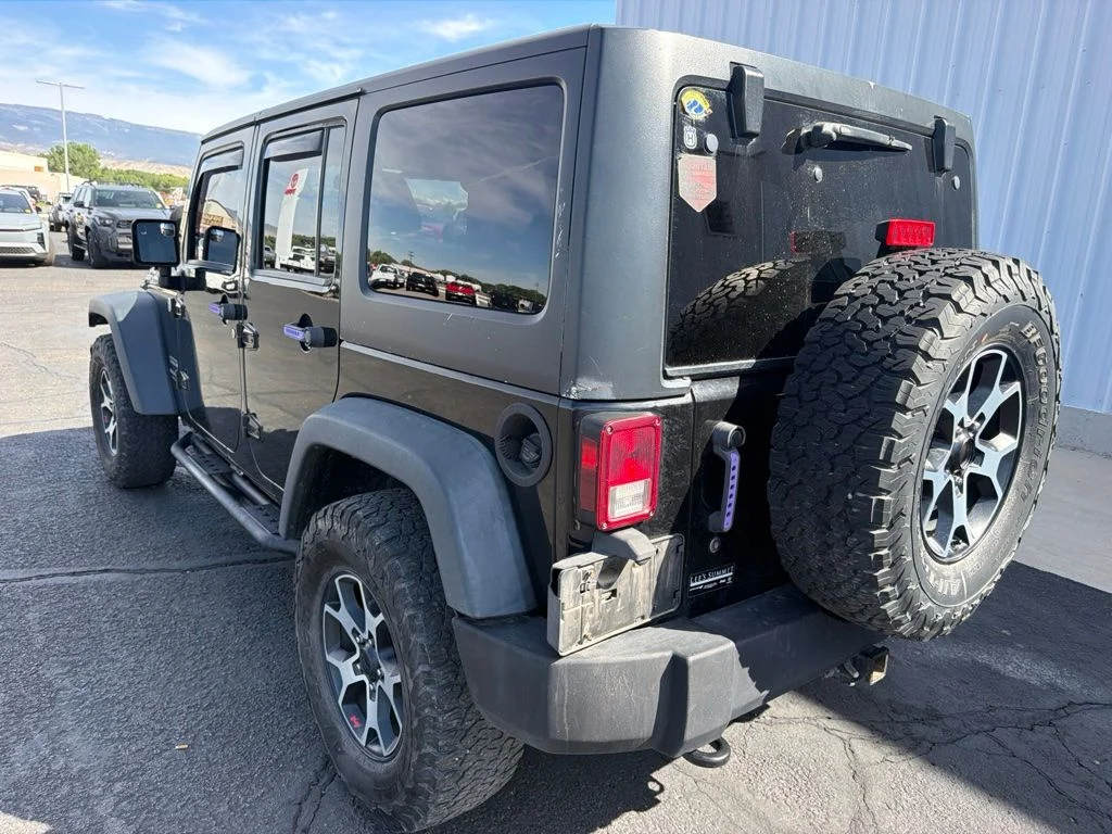 Used 2014 Black Clearcoat Jeep Unlimited Sport image 6