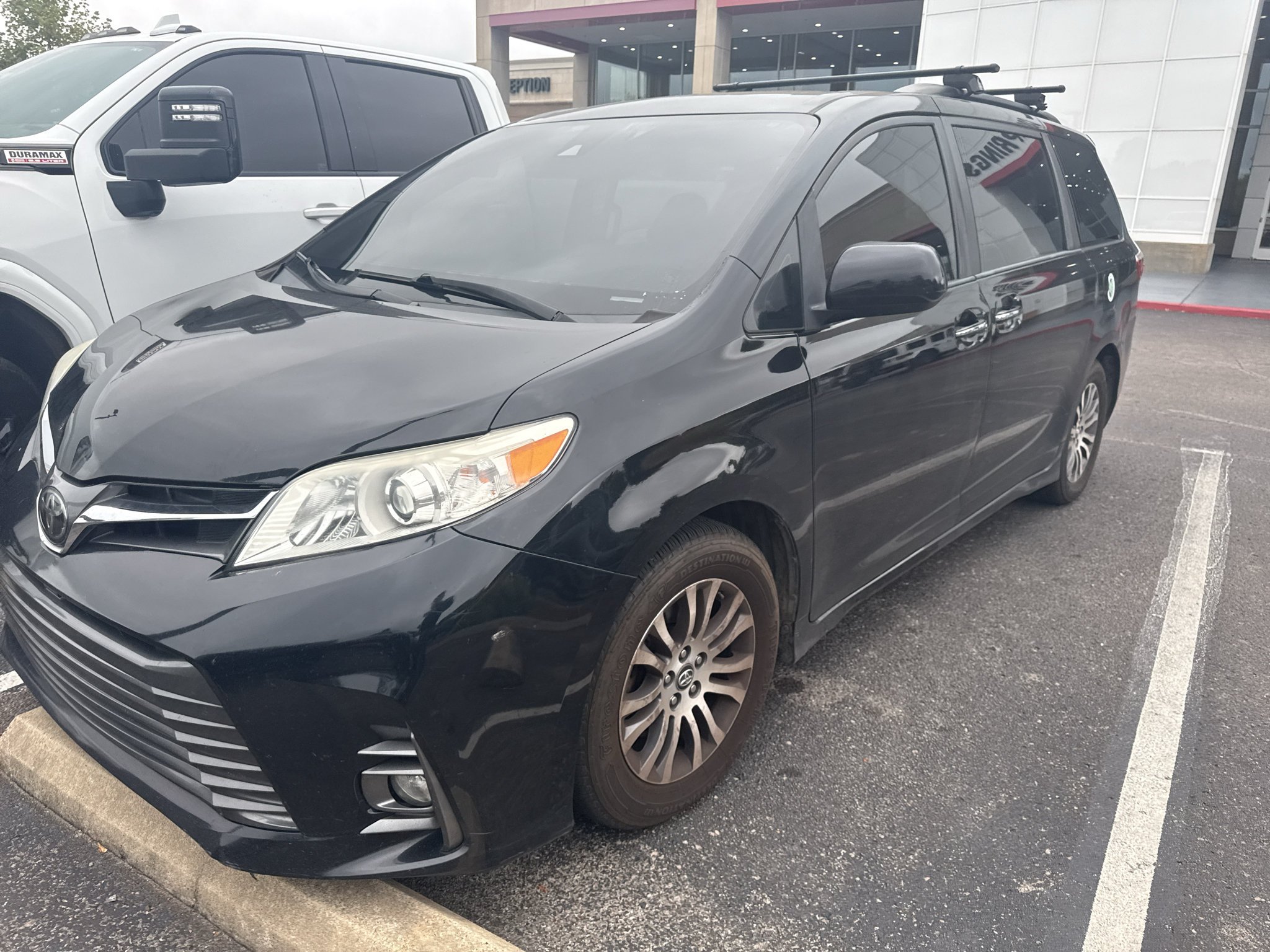 Used 2018 MIDNIGHT BLACK METALLIC Toyota XLE image 1