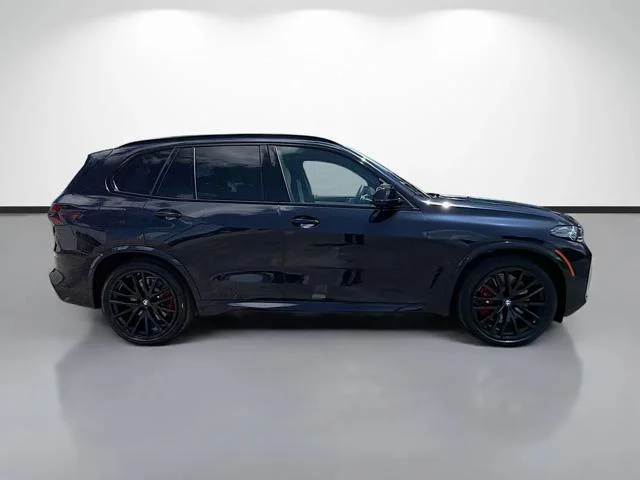 New 2026 Carbon Black Metallic BMW M60i image 2