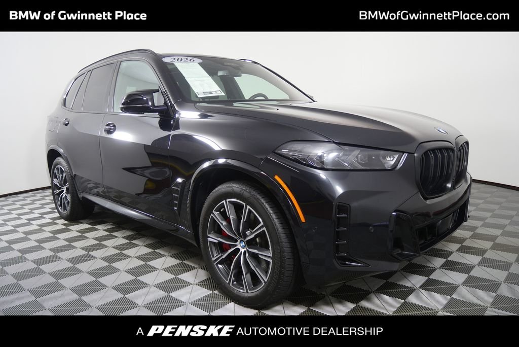 Certified Used 2026 Black Sapphire Metallic BMW M60i image 1