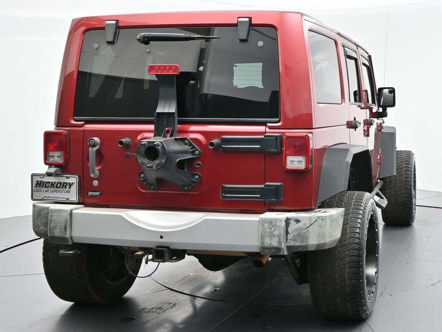 Used 2011 Deep Cherry Red Crystal Pearlcoat Jeep Sahara image 6