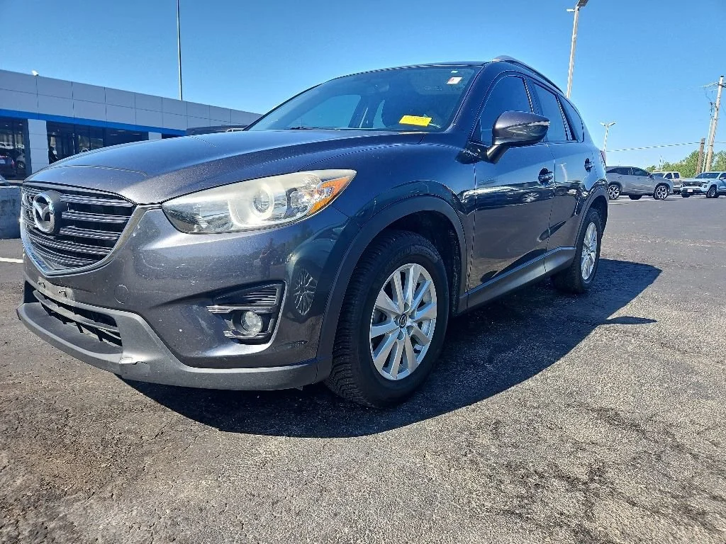 Used 2016 Mazda CX-5 Touring with VIN JM3KE4CY0G0640116 for sale in Kansas City