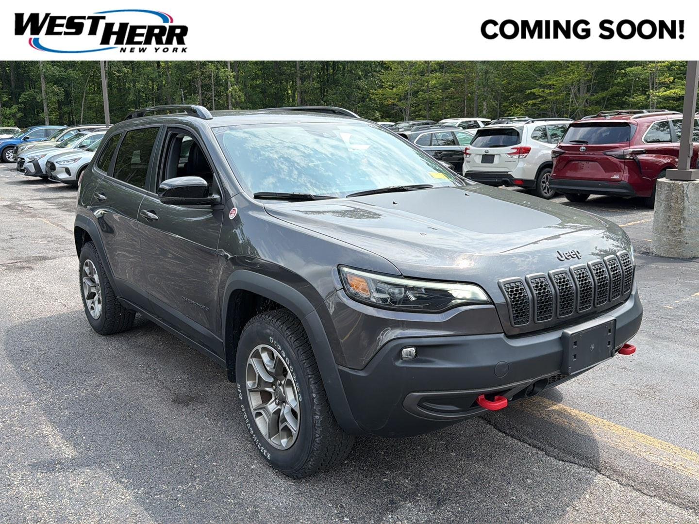 Used 2022 Granite Crystal Metallic Clearcoat Jeep Trailhawk image 1