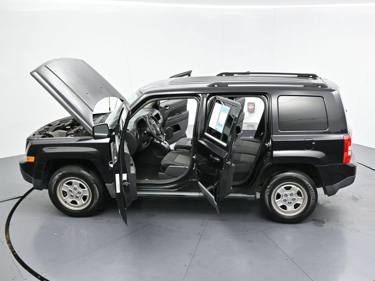 Used 2011 Brilliant Black Crystal Pearl Jeep Sport image 31
