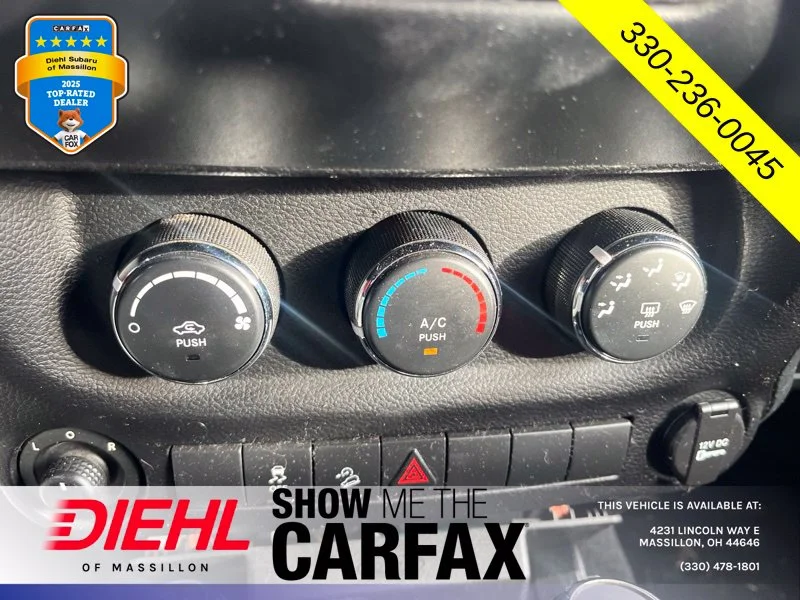 Used 2013 Orange Jeep Unlimited Sport image 17