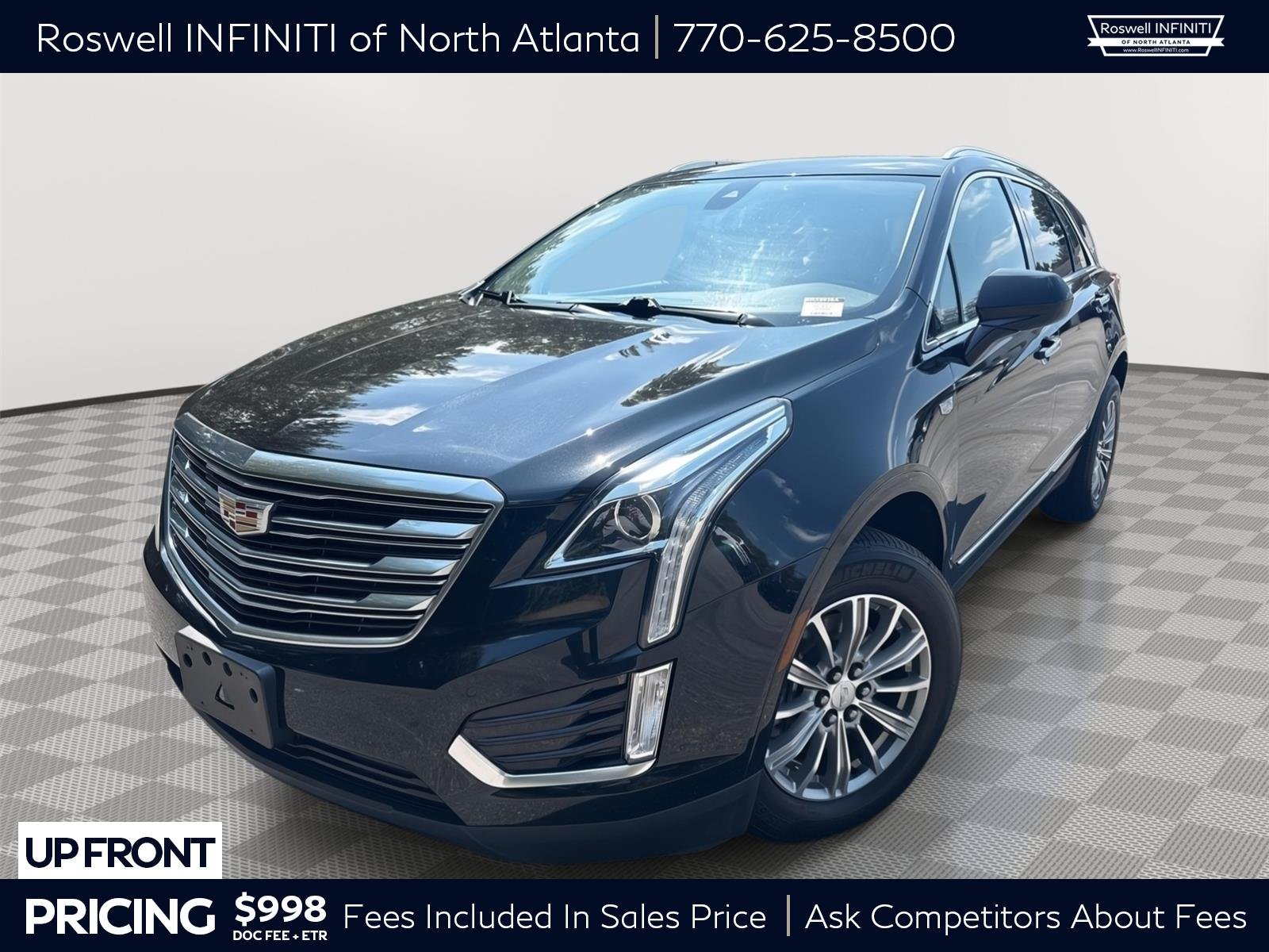Used 2017 Stellar Black Metallic Cadillac Luxury FWD image 1
