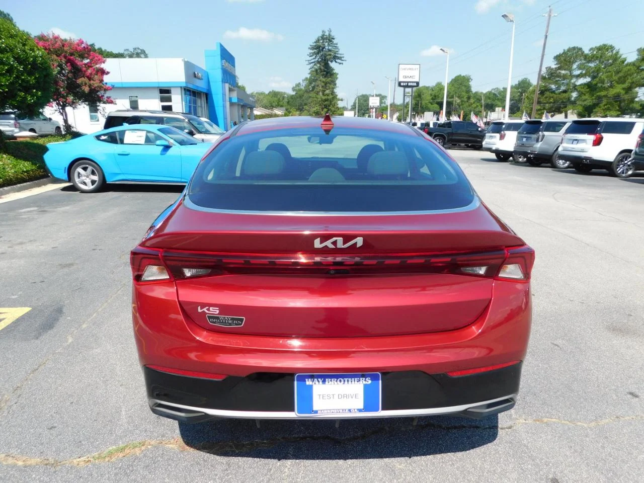 Used 2023 Burgundy Kia LXS AUTO FWD image 7