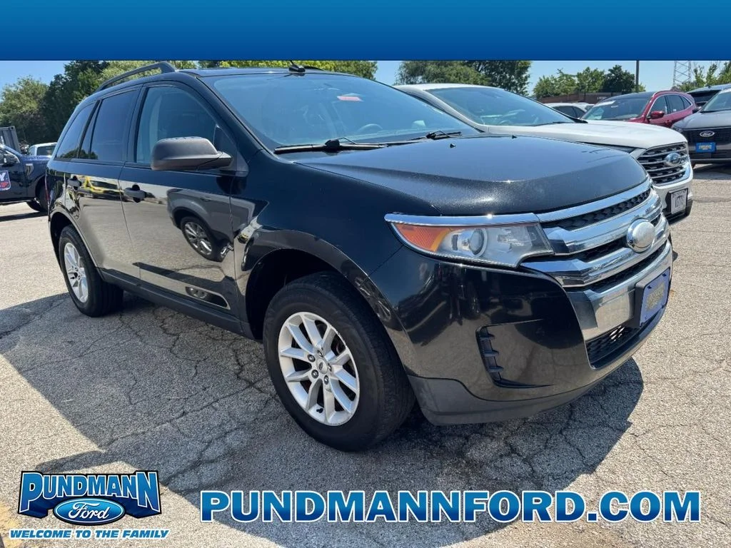 Used 2013 Tuxedo Black Metallic Ford SE image 1
