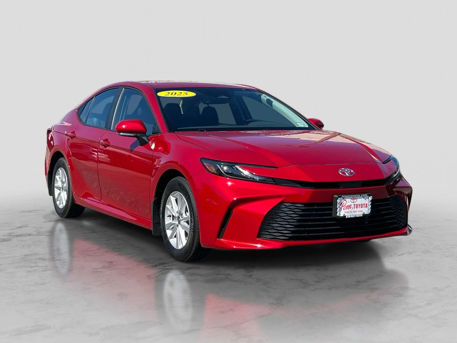 Used 2025 SUPERSONIC RED Toyota LE image 1
