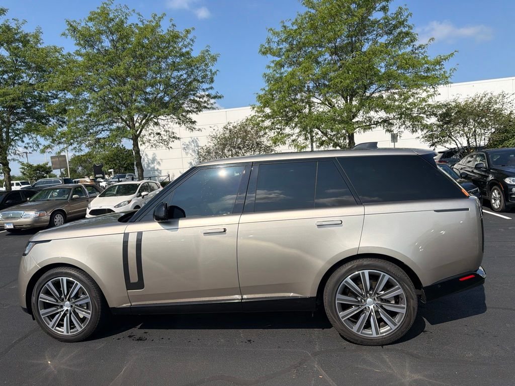 Used 2023 Gold Land Rover SE image 2