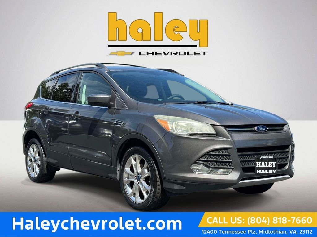 Used 2013 Gray Ford SE image 1