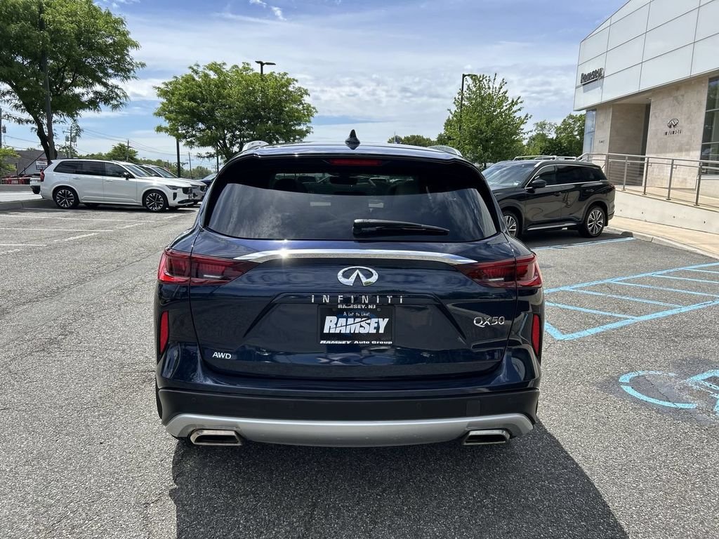 Certified Used 2023 Blue INFINITI LUXE image 7