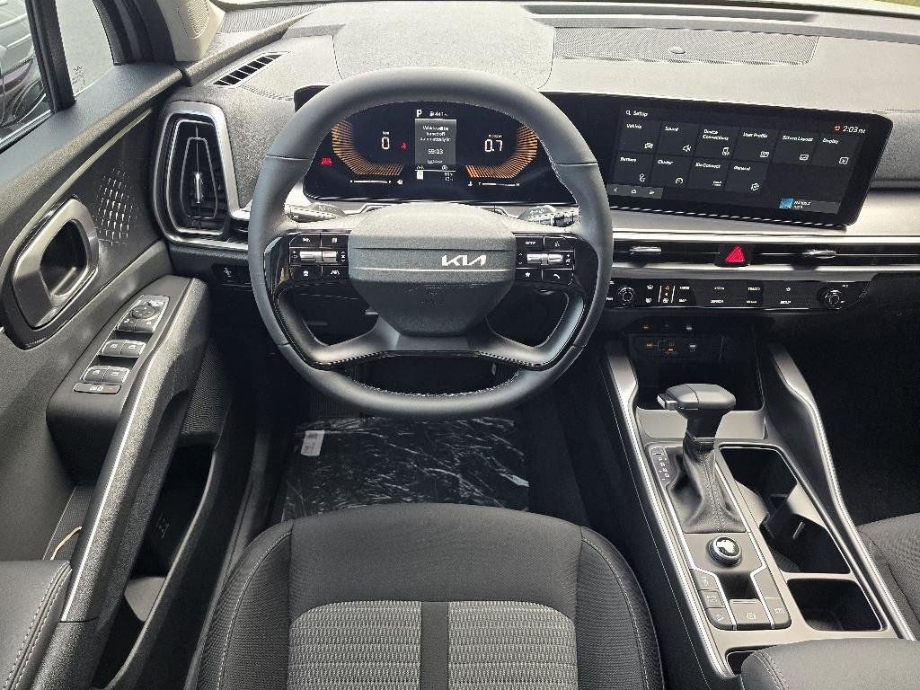 New 2026 Ivory Silver Kia LX image 6
