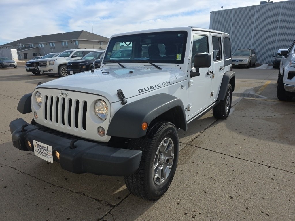 Used 2016 Jeep Wrangler Unlimited Rubicon with VIN 1C4BJWFG3GL239015 for sale in Spirit Lake, IA