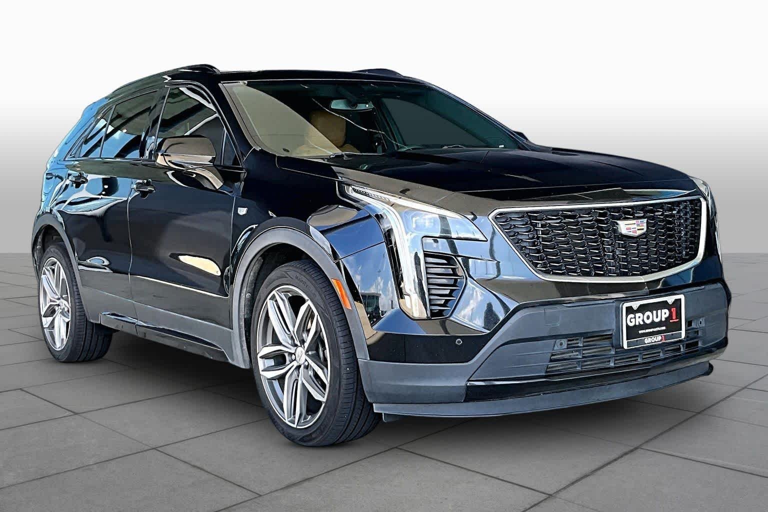 Used 2019 Stellar Black Metallic Cadillac FWD Sport image 3