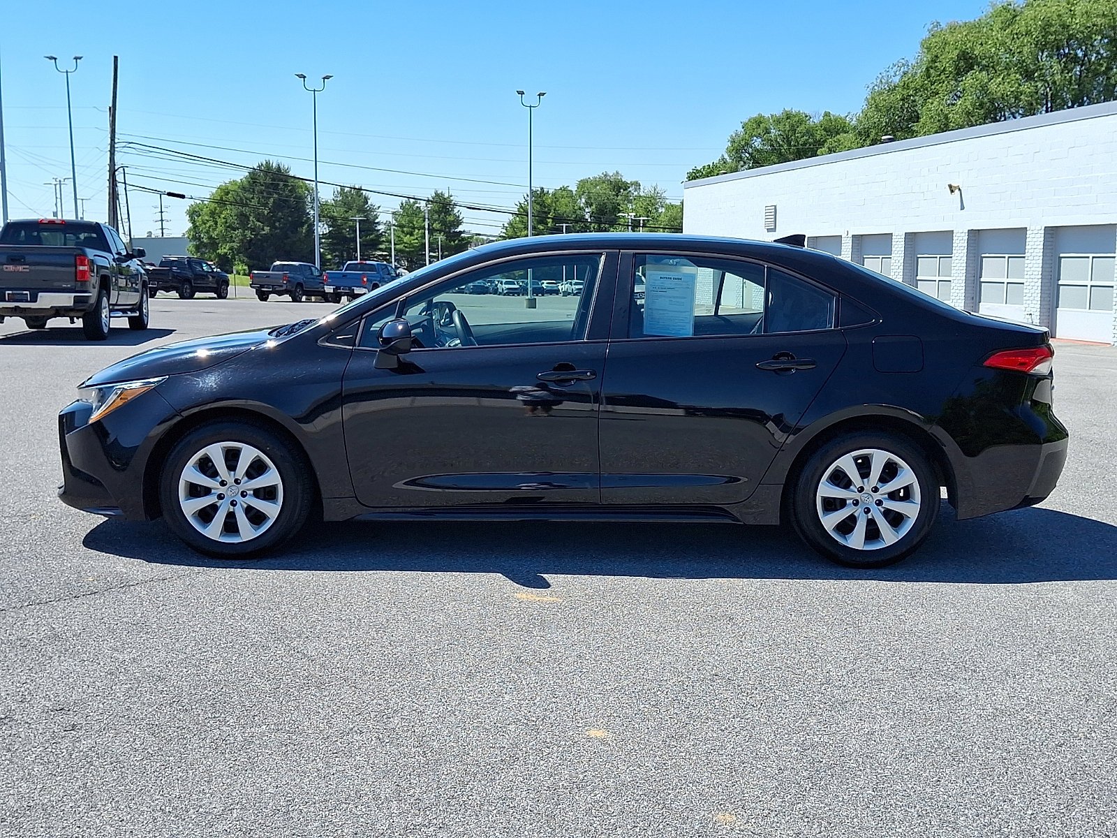 Used 2025 Midnight Black Metallic Toyota LE image 4