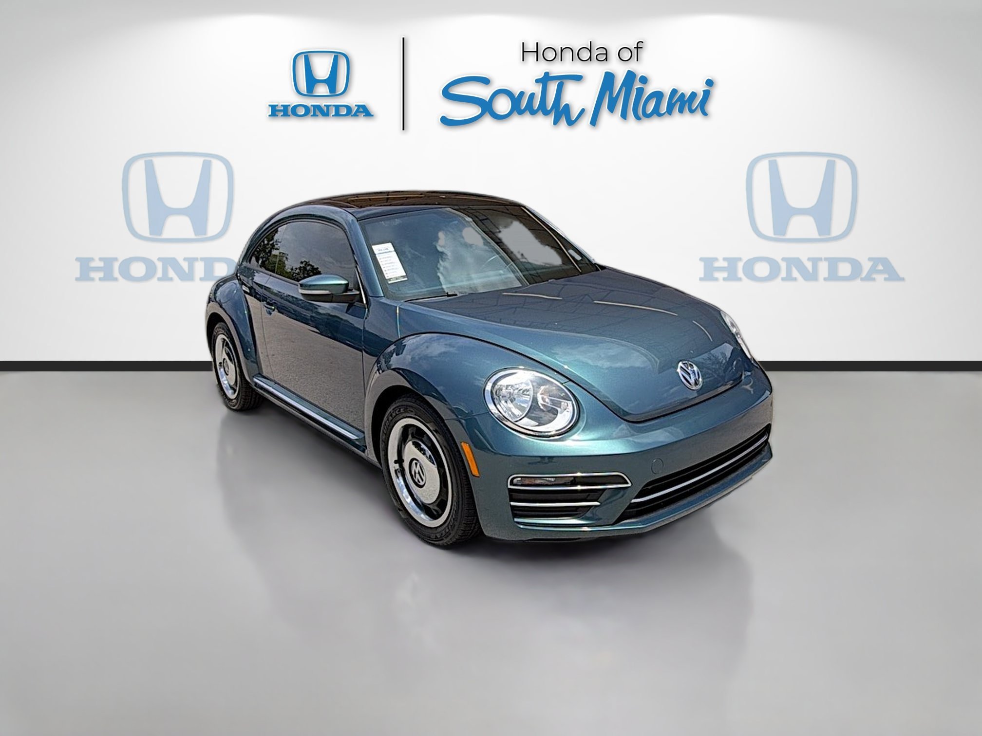 Used 2018 Teal Metallic Volkswagen Coast image 1