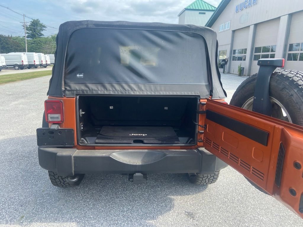 Used 2011 Mango Tango Pearlcoat Jeep Sport image 9