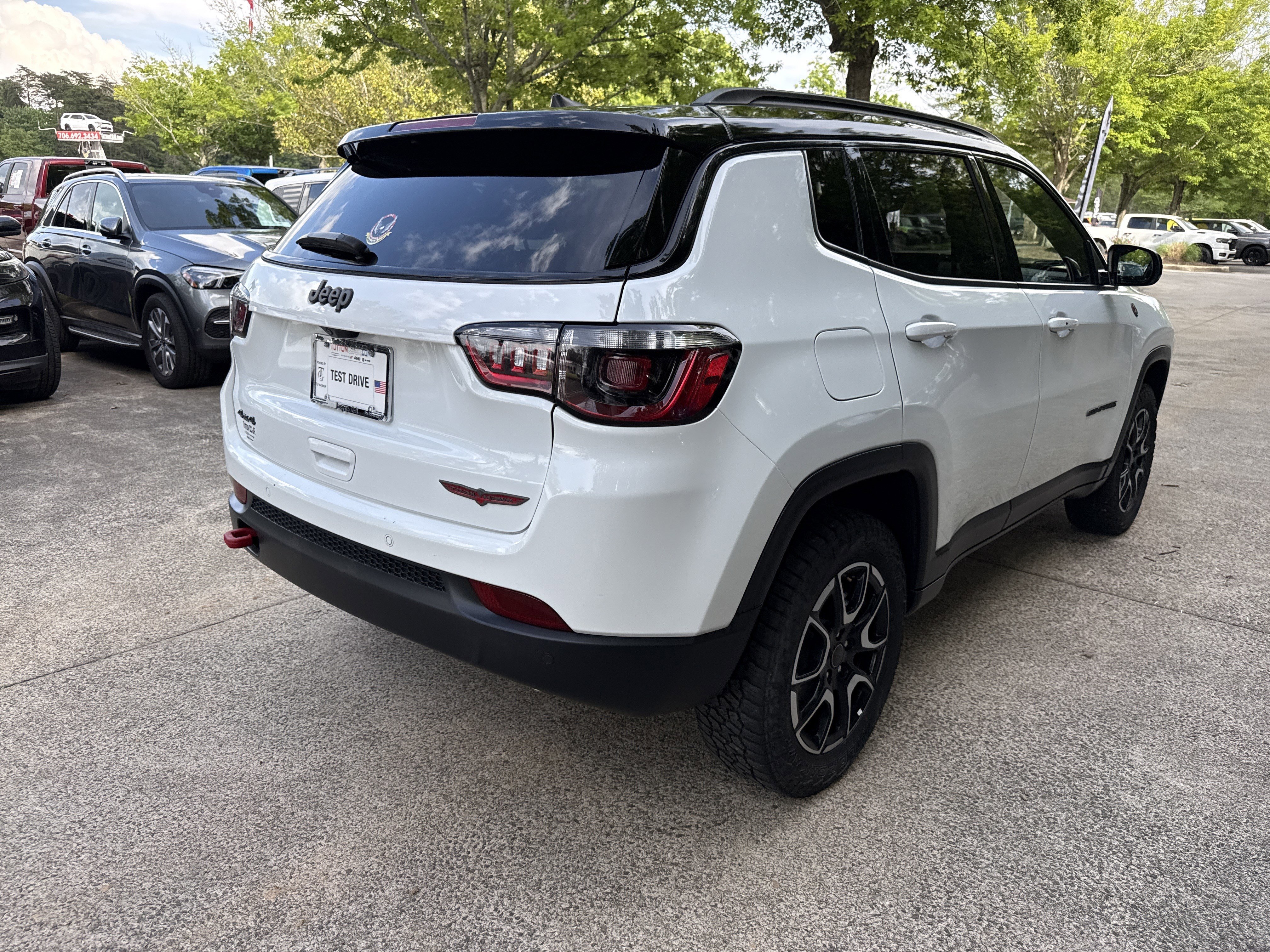 Used 2025 Bright White Clearcoat Jeep Trailhawk image 7
