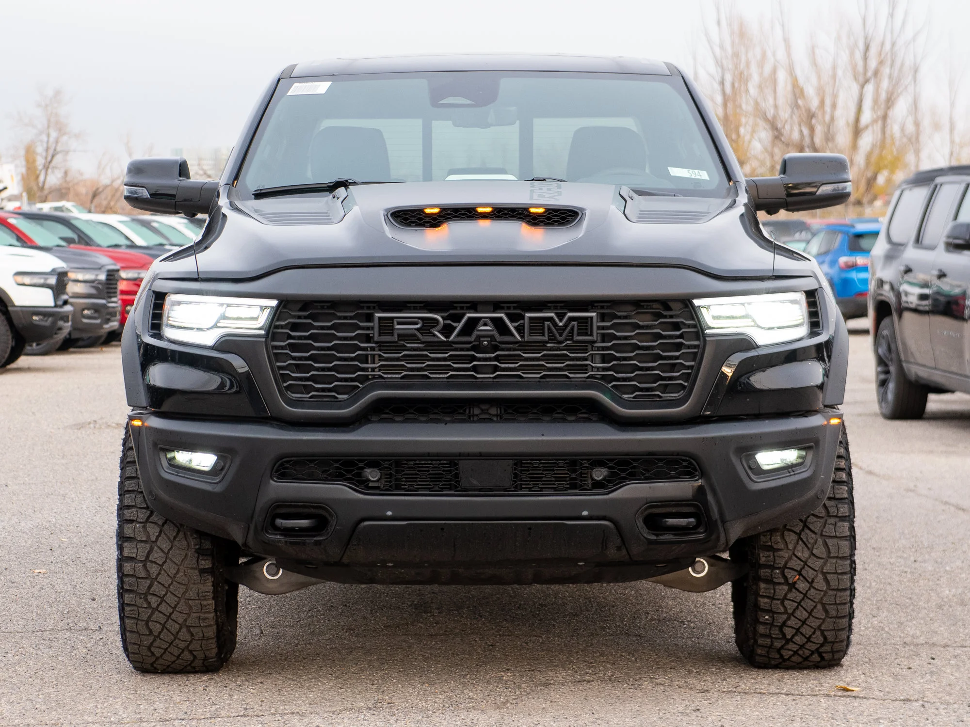 New 2026 Black RAM RHO* Crew Cab 4x4, 540HP, 35 Inch Tires, Massage Seats, Passenger Screen image 13