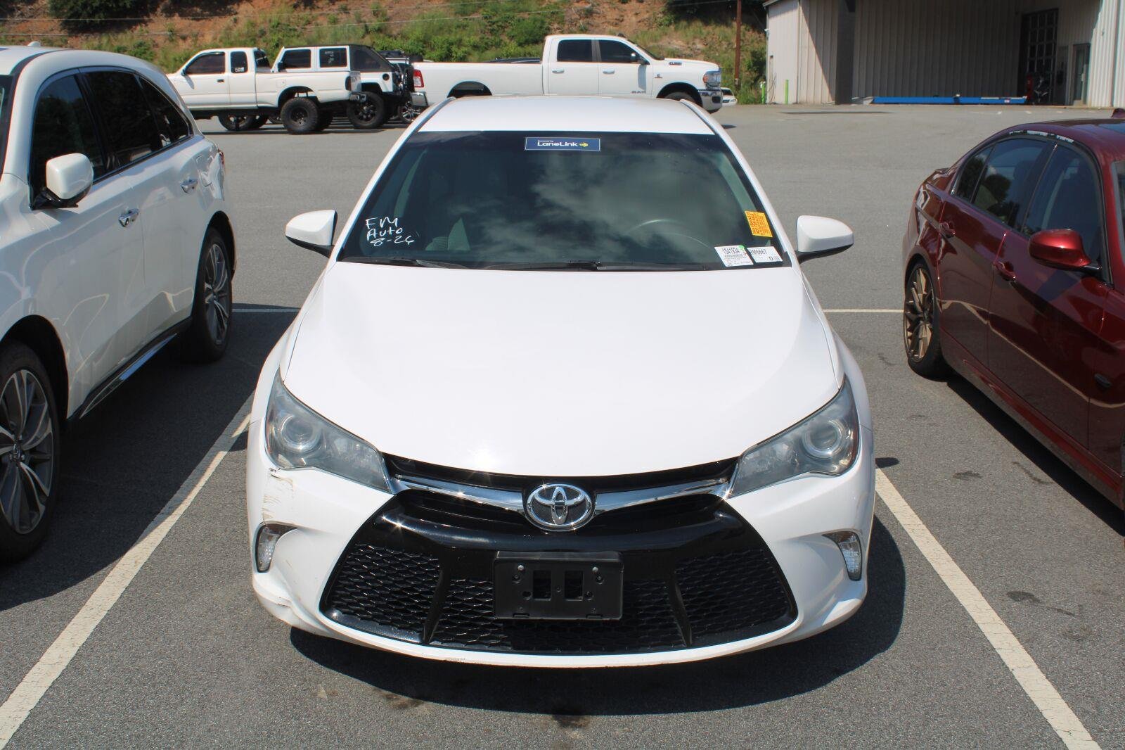 Used 2015 Super White Toyota LE image 2