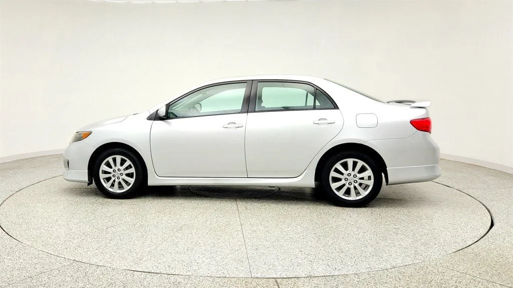 Used 2010 Classic Silver Metallic Toyota 4dr Sedan Manual S w/ Power Moonroof & 16