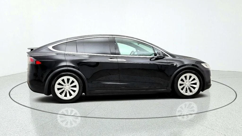 Used 2019 Solid Black Tesla Long Range AWD image 4