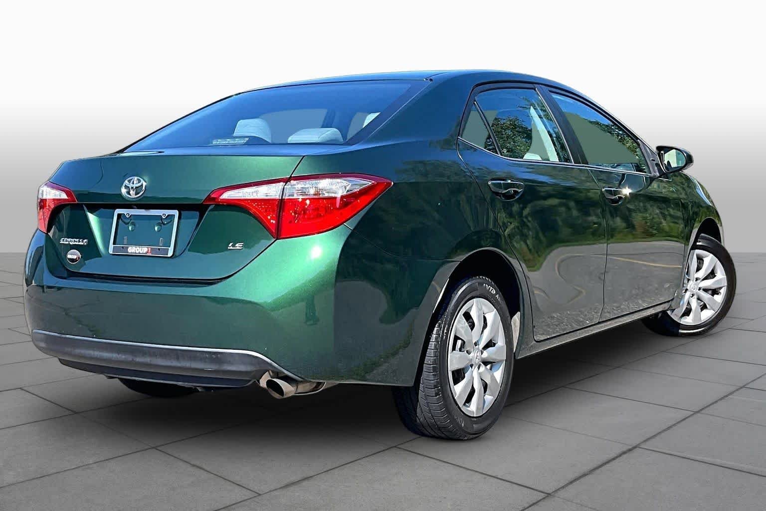 Used 2016 4Evergreen Metallic Toyota LE image 13