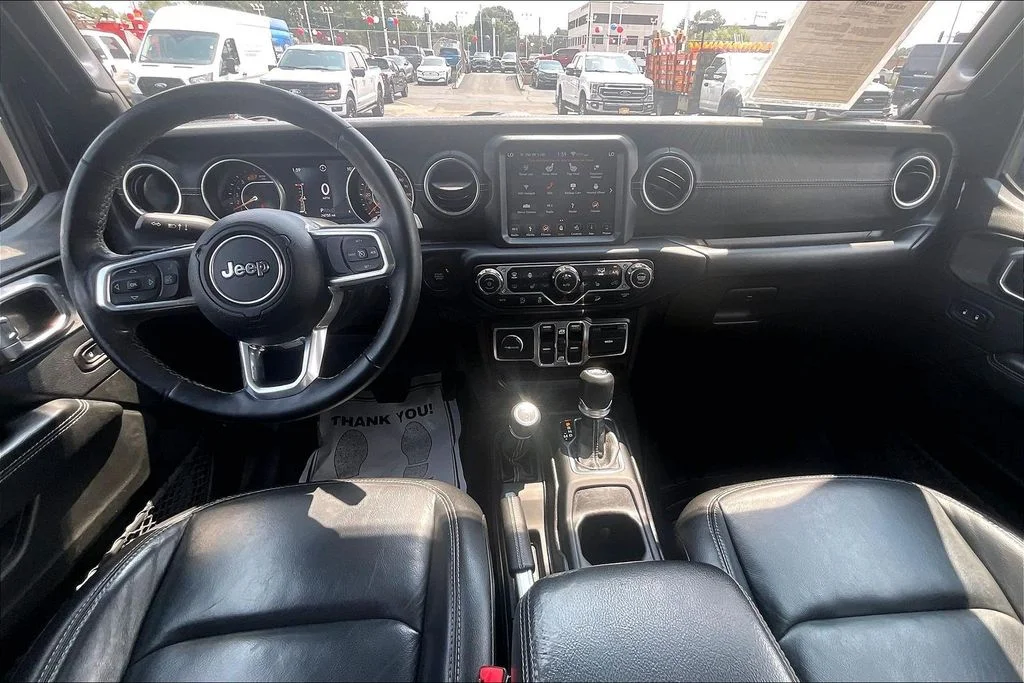 Used 2018 Black Jeep Unlimited Sahara image 13