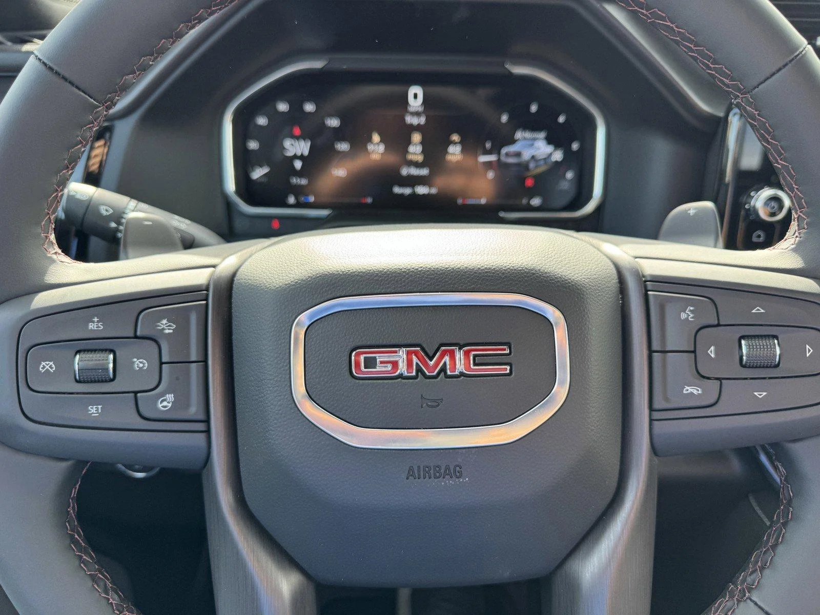 New 2026 TITANIUM RUSH METALLIC GMC AT4X image 23