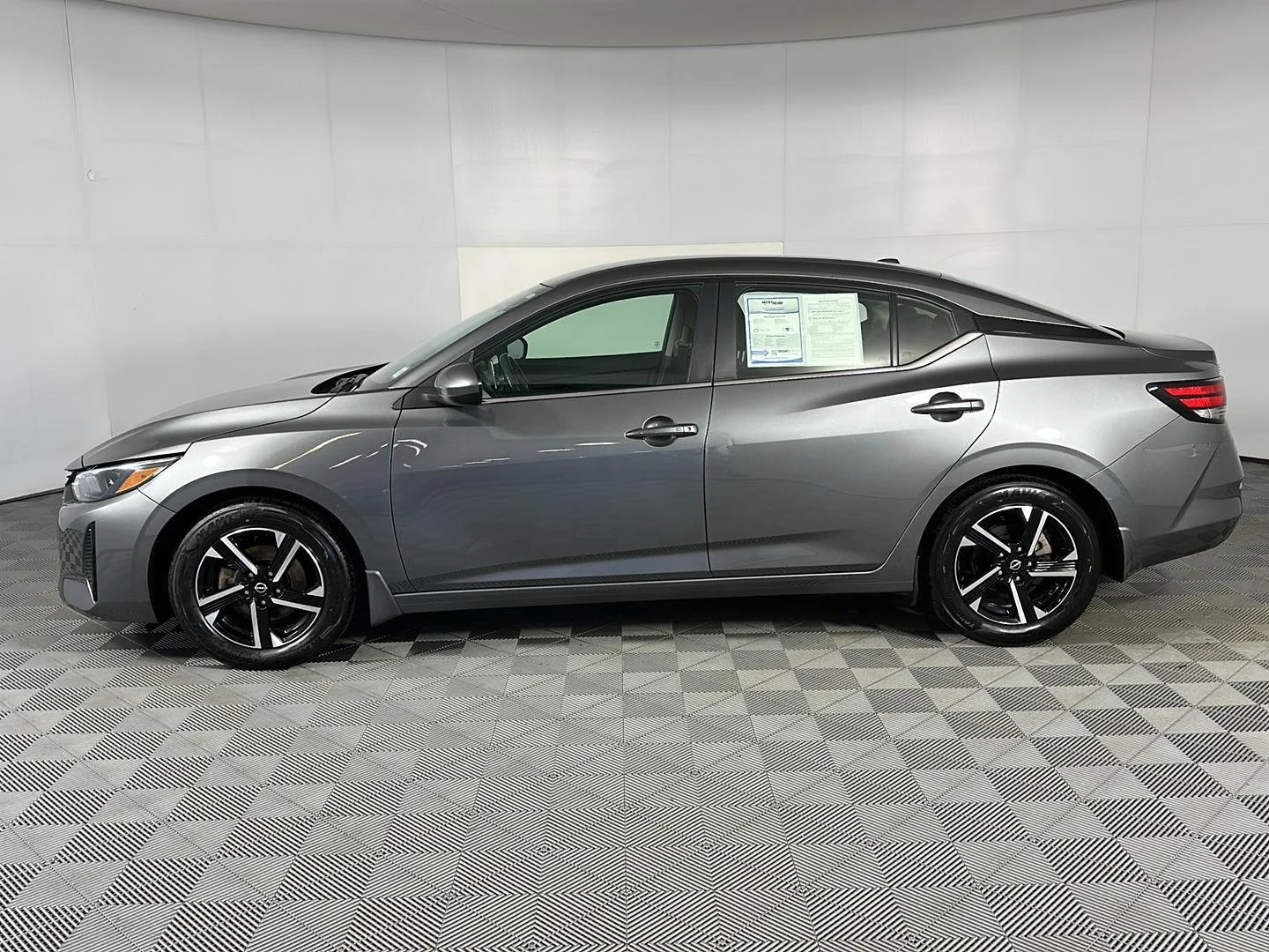 Used 2024 Gun Metallic Nissan SV image 6
