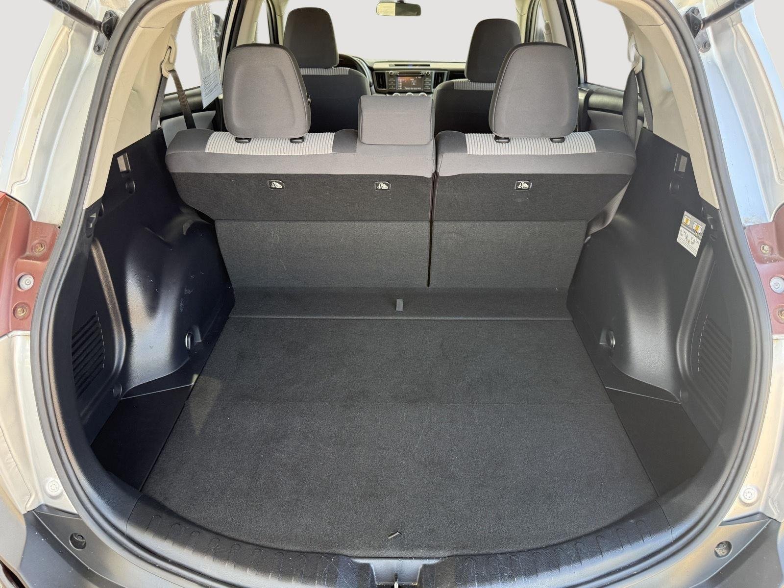 Used 2014 Classic Silver Metallic Toyota LE image 22