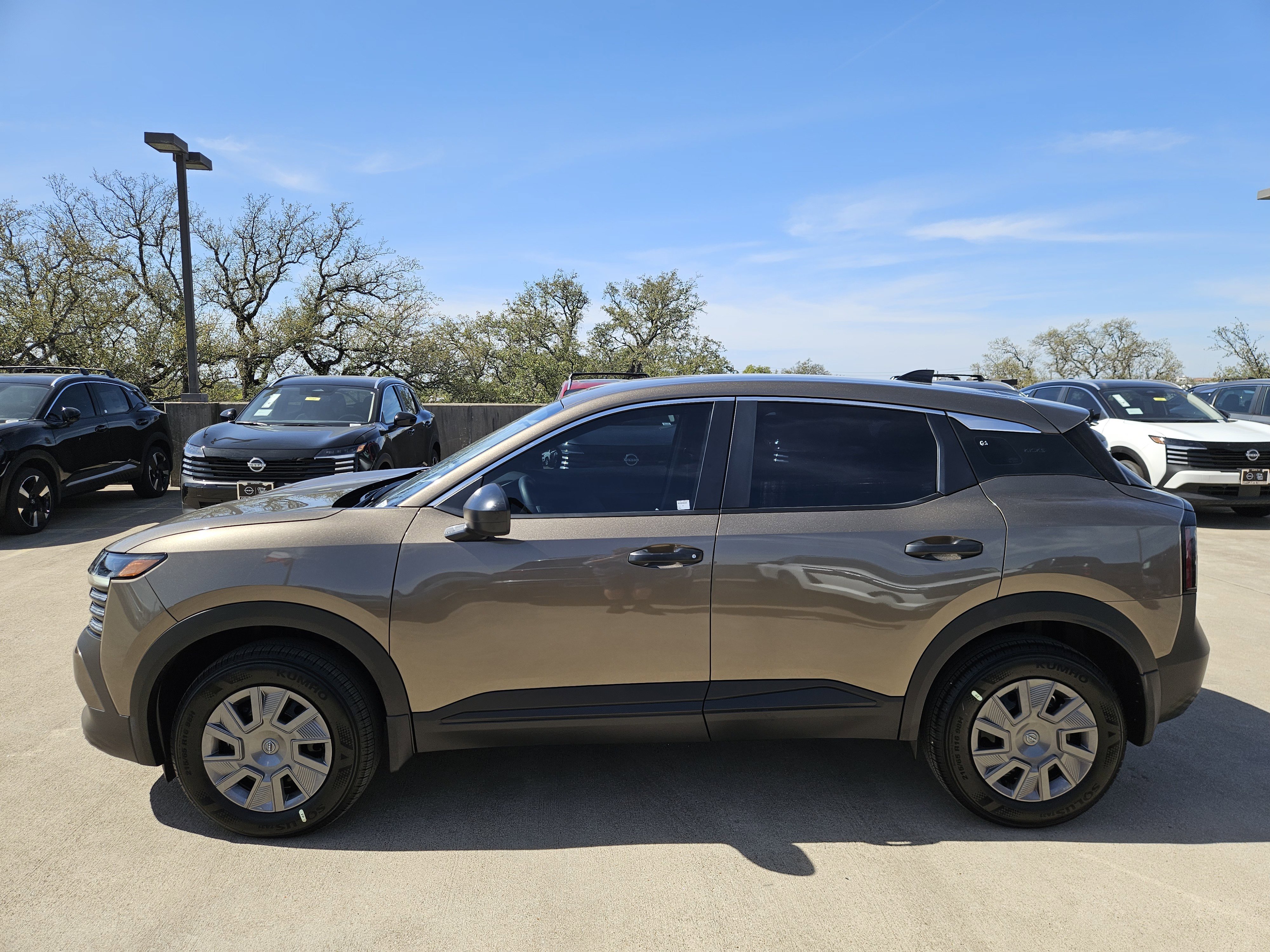 New 2026 Canyon Bronze Metallic Nissan S image 4