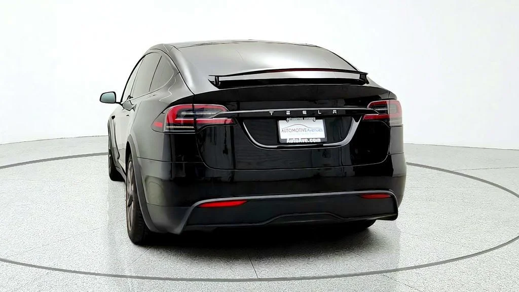 Used 2023 Solid Black Tesla AWD image 6