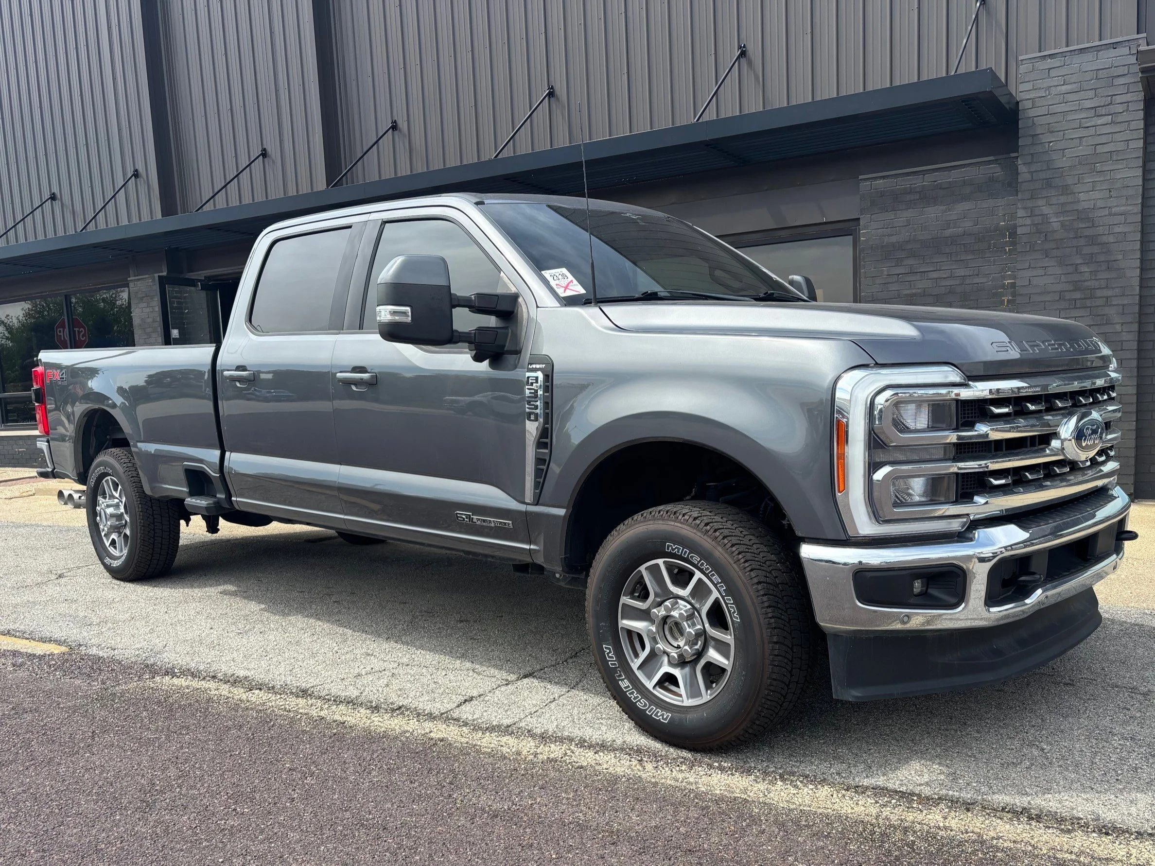 Used 2023 Carbonized Gray Metallic Ford LARIAT image 3