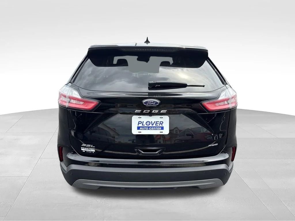 Used 2024 Agate Black Metallic Ford SEL image 5