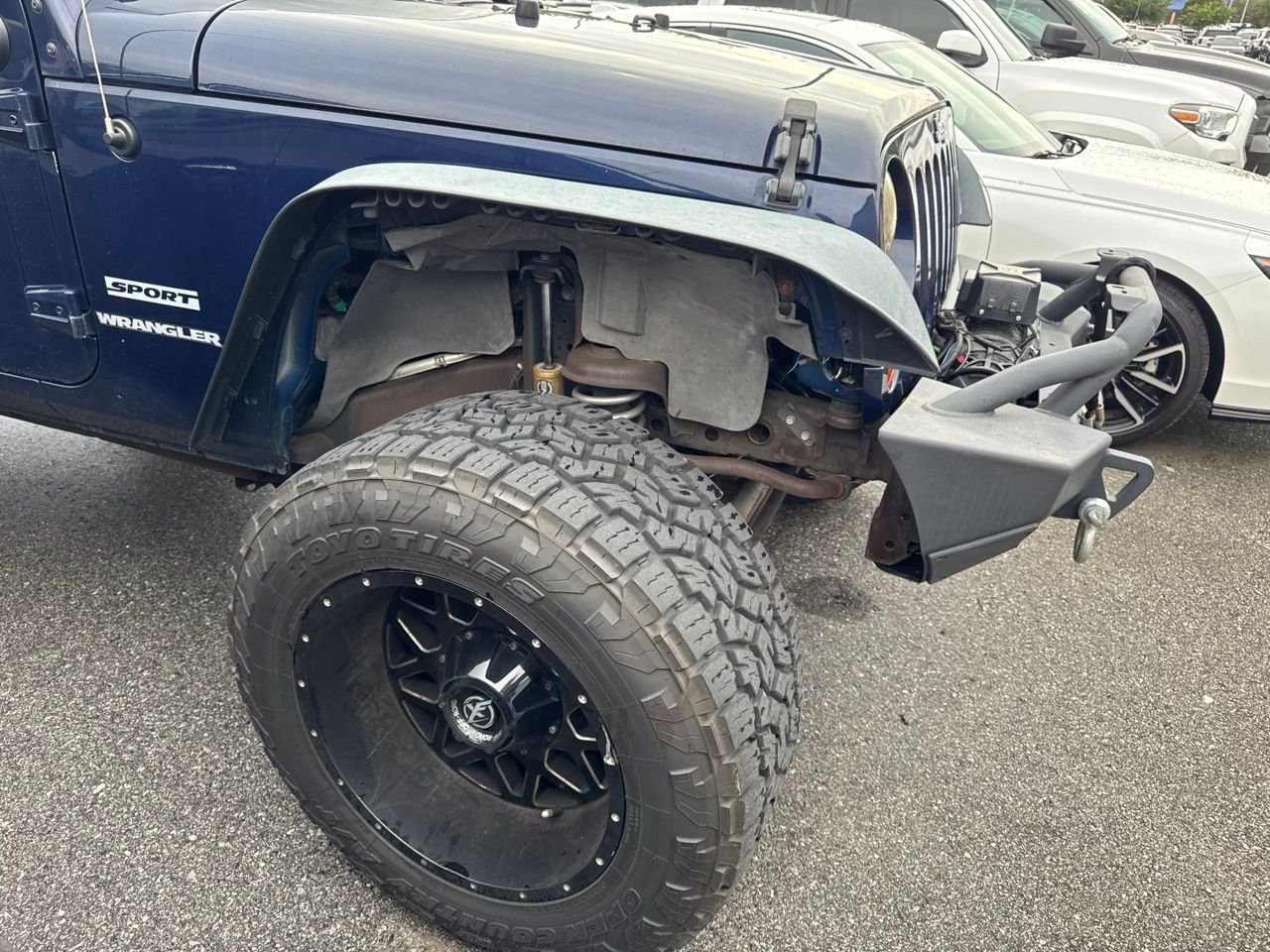 Used 2013 Blue Jeep Sport image 4