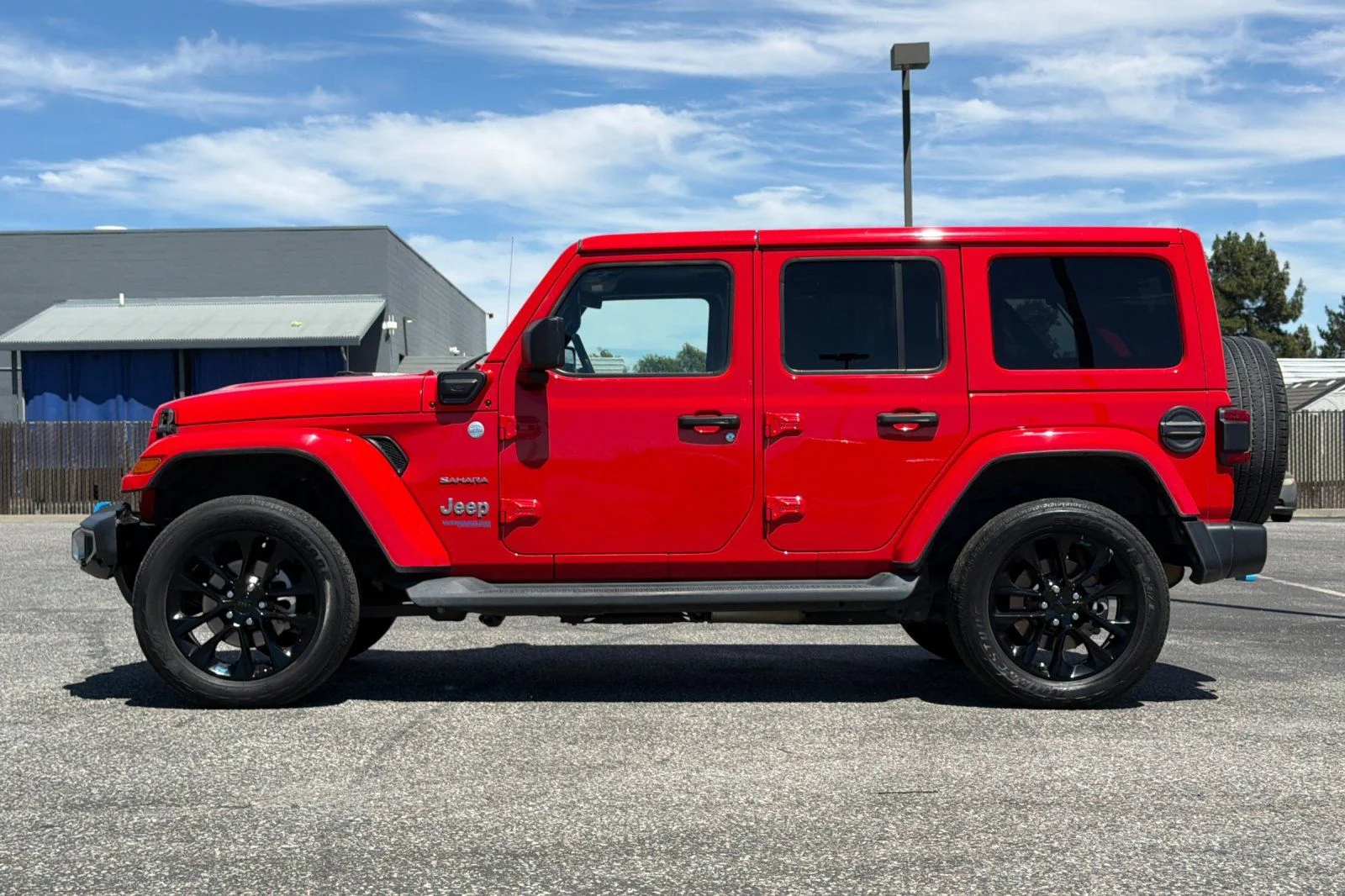 Used 2022 Red Jeep Unlimited Sahara 4xe image 9
