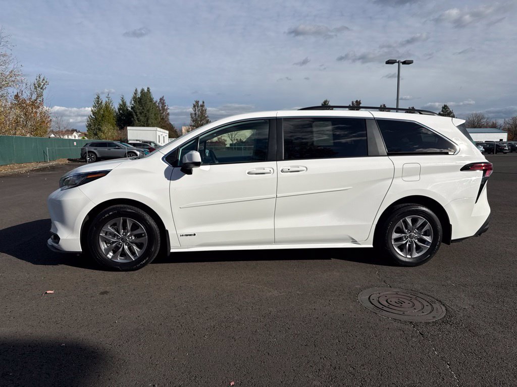 Used 2021 Super White Toyota LE image 4
