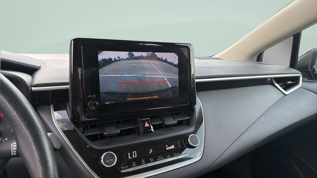 Used 2024 Black Toyota LE image 16