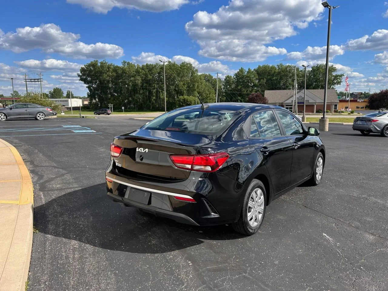Used 2022 Black Kia LX image 3