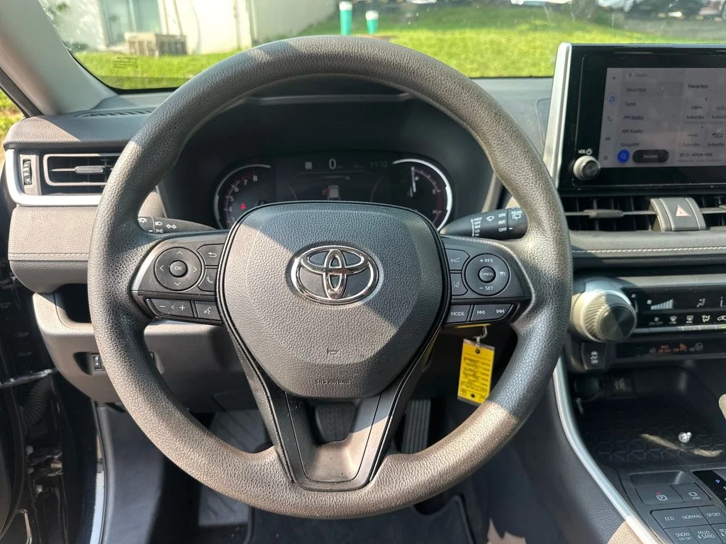 Used 2024 Black Toyota LE image 13