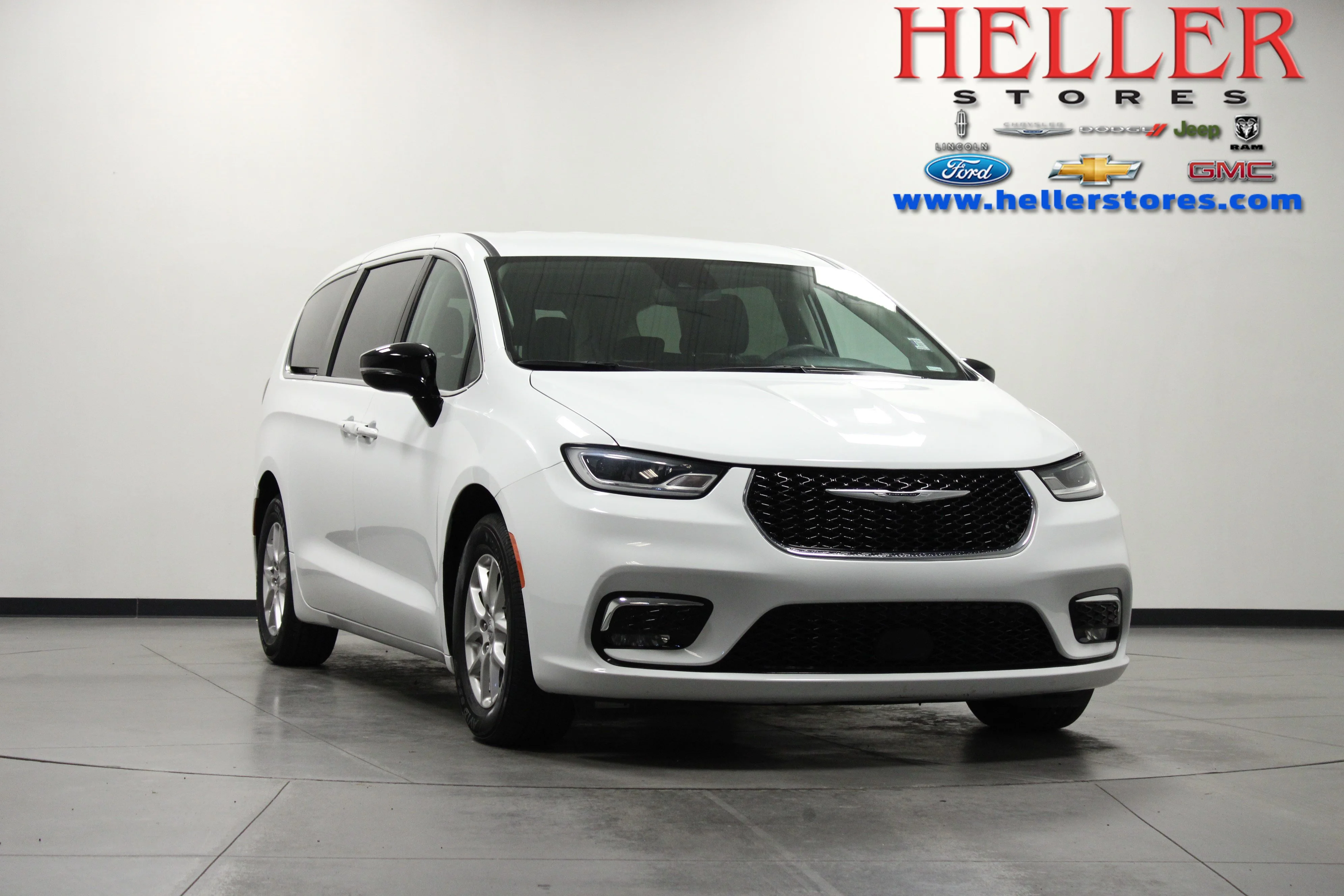 Used 2024 Bright White Clearcoat Chrysler Touring L image 1