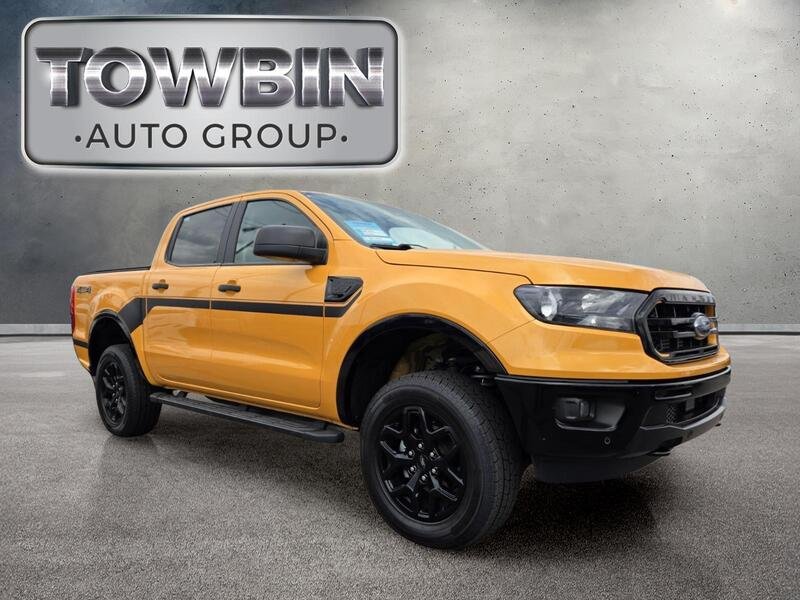 Used 2022 Orange Metallic FORD XLT 4WD SUPERCREW 5