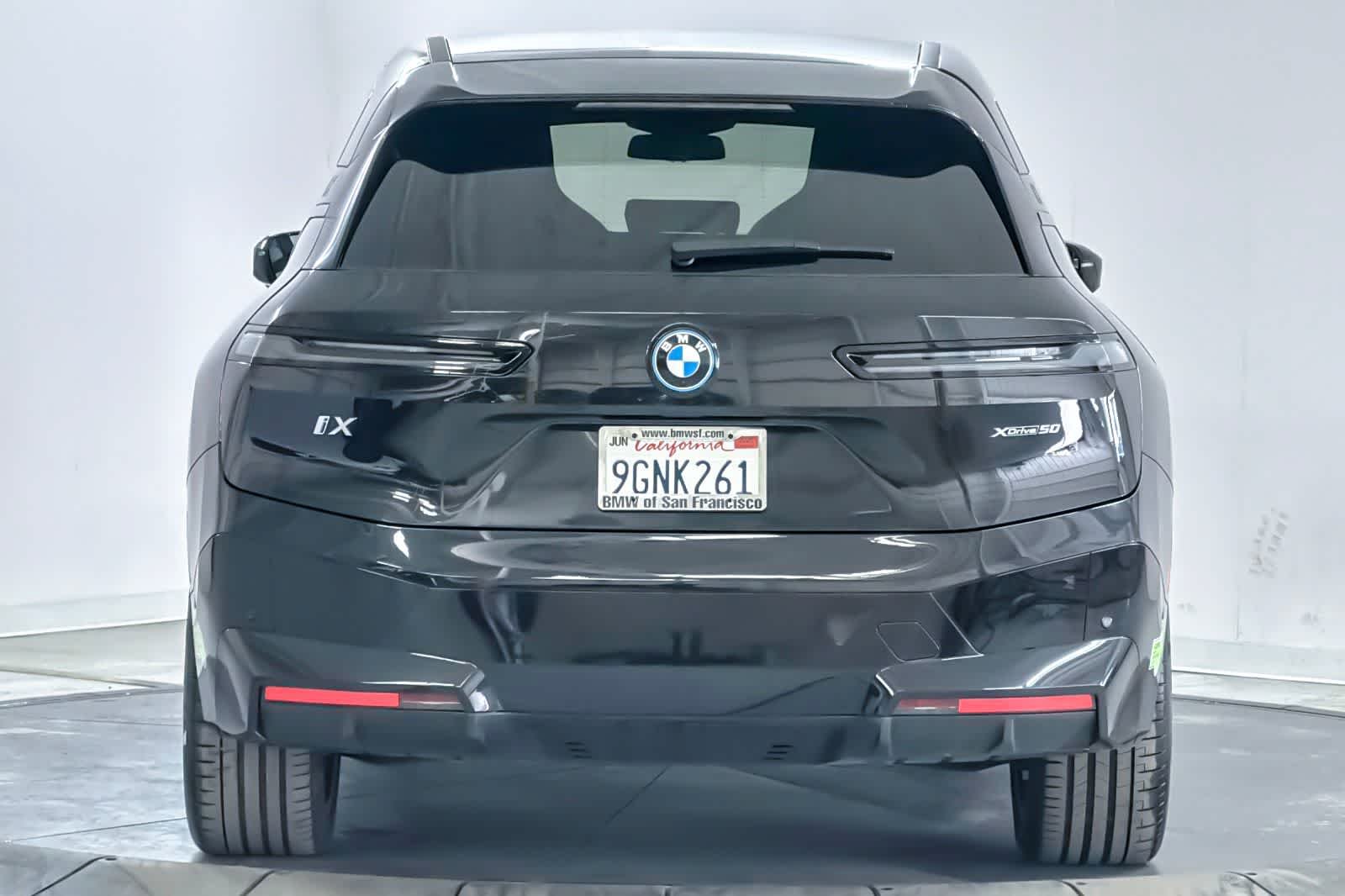 Used 2024 Black Sapphire Metallic BMW xDrive50 image 7