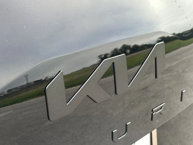 Used 2025 Black Kia EX X-Line image 13