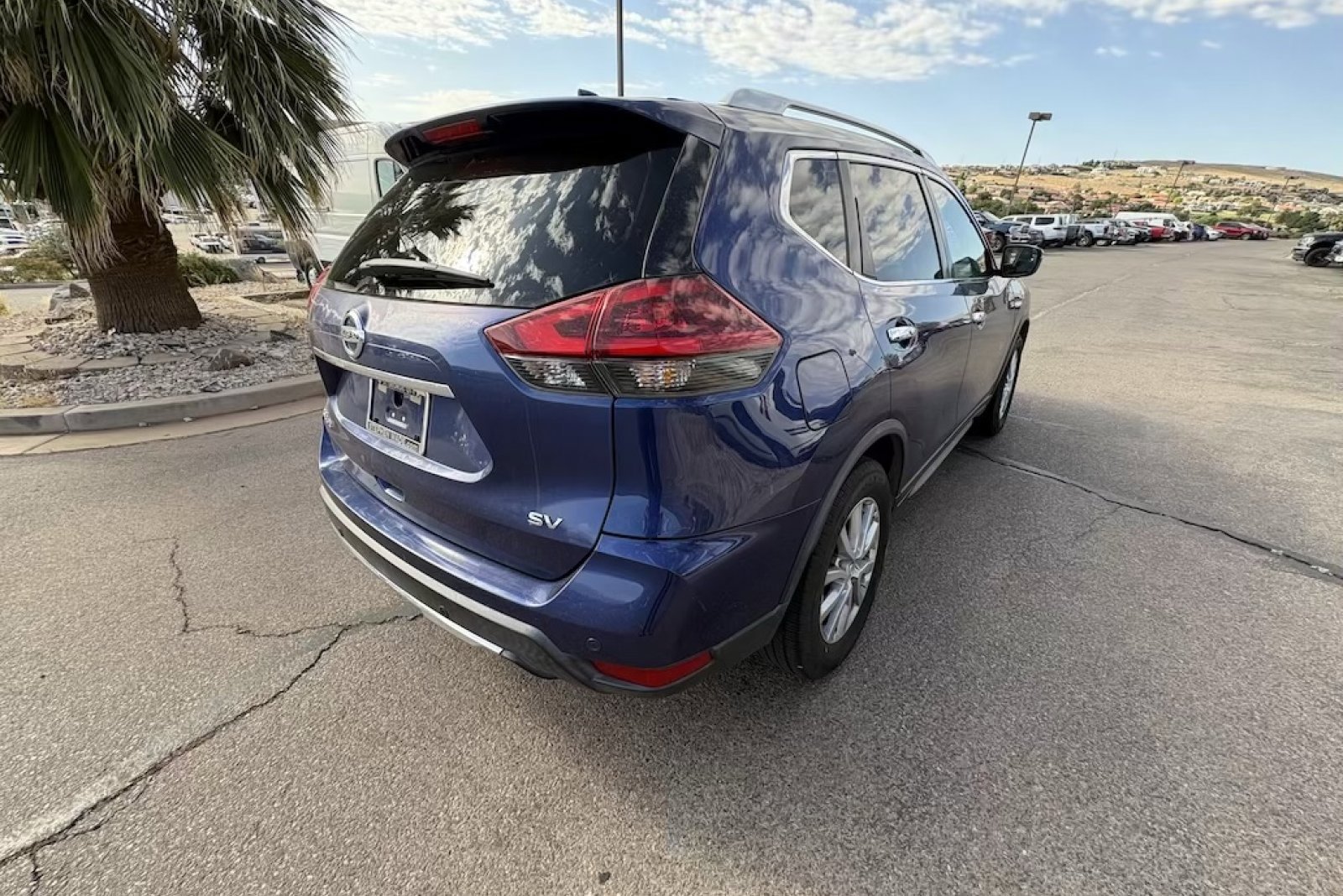 Used 2019 Caspian Blue Metallic Nissan SV image 6
