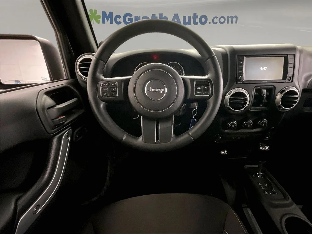 Used 2013 Black Jeep Unlimited Sahara image 7